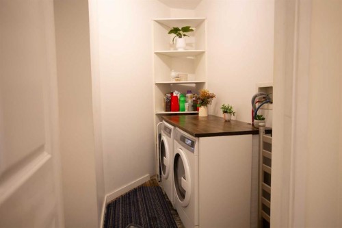 1707-1108 6 Avenue Sw, Calgary, AB - Indoor Photo Showing Laundry Room