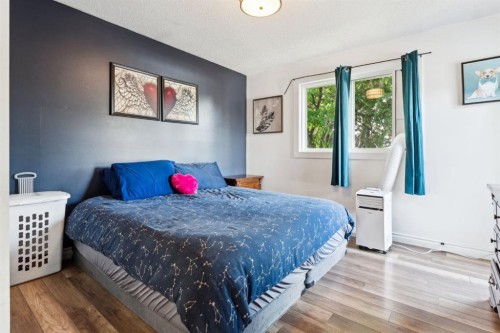 147 Falchurch Crescent Ne, Calgary, AB - Indoor Photo Showing Bedroom