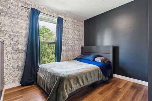 147 Falchurch Crescent Ne, Calgary, AB - Indoor Photo Showing Bedroom