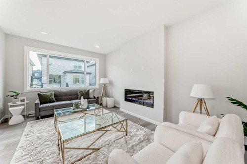 41 Walgrove Bay Se, Calgary, AB - Indoor Photo Showing Living Room With Fireplace