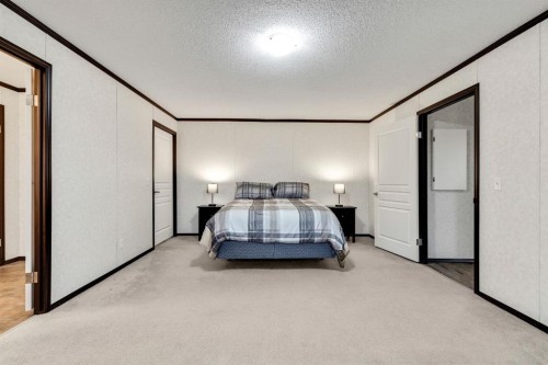 117 Range Rd 250, Mossleigh, AB - Indoor Photo Showing Bedroom