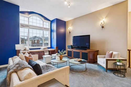 54 Discovery Ridge Gardens Sw, Calgary, AB - Indoor Photo Showing Living Room