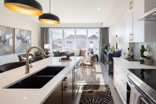 41 Wild Rose Way Se, Calgary, AB - Indoor Photo Showing Kitchen With Double Sink With Upgraded Kitchen