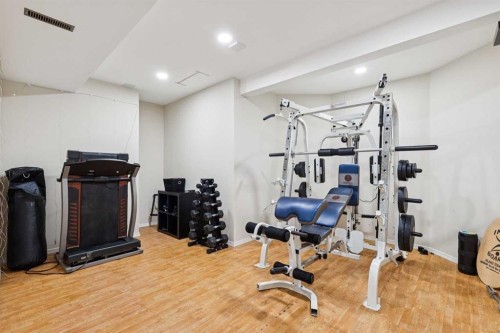 206 Signal Hill Point Sw, Calgary, AB - Indoor Photo Showing Gym Room