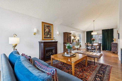 206 Signal Hill Point Sw, Calgary, AB - Indoor Photo Showing Living Room With Fireplace