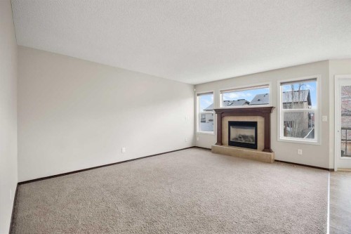 49 Sage Valley Manor Nw, Calgary, AB - Indoor Photo Showing Living Room With Fireplace