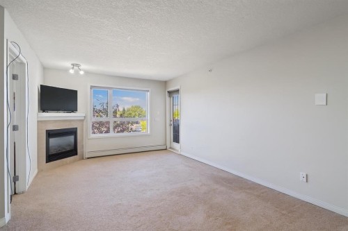 302-8200 4 Street Ne, Calgary, AB - Indoor Photo Showing Laundry Room