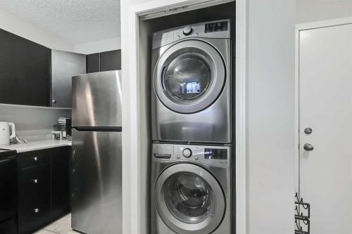 1807-1053 10 Street Sw, Calgary, AB - Indoor Photo Showing Laundry Room