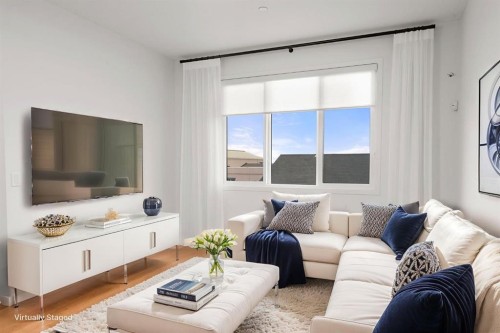 76 Lucas Common Nw, Calgary, AB - Indoor Photo Showing Living Room