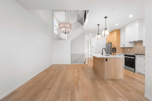 76 Lucas Common Nw, Calgary, AB - Indoor Photo Showing Kitchen With Upgraded Kitchen