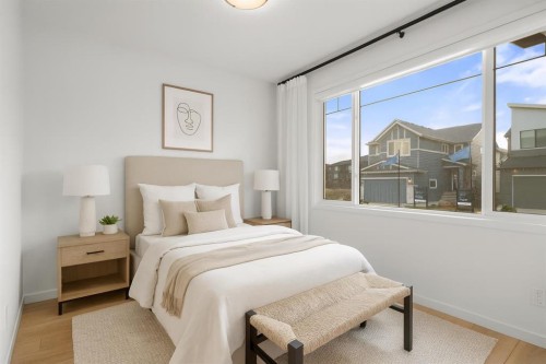76 Lucas Common Nw, Calgary, AB - Indoor Photo Showing Bedroom