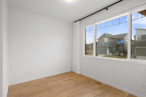 76 Lucas Common Nw, Calgary, AB - Indoor Photo Showing Other Room