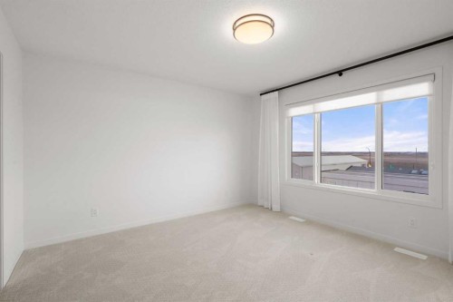 76 Lucas Common Nw, Calgary, AB - Indoor Photo Showing Other Room