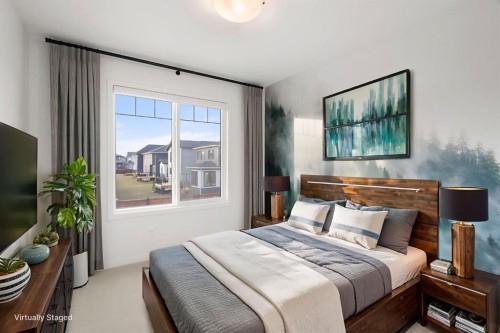 76 Lucas Common Nw, Calgary, AB - Indoor Photo Showing Bedroom
