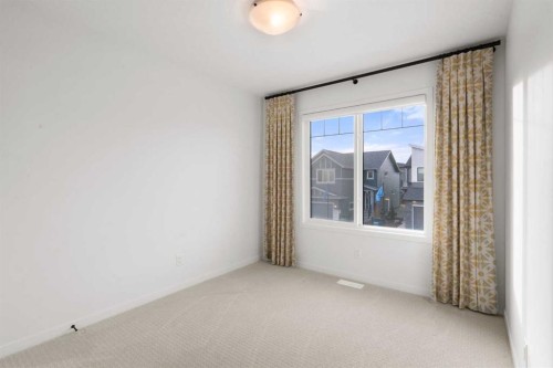 76 Lucas Common Nw, Calgary, AB - Indoor Photo Showing Other Room