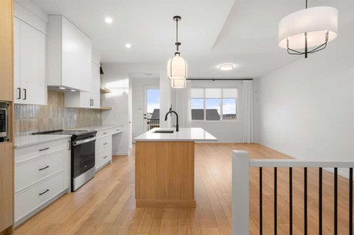 76 Lucas Common Nw, Calgary, AB - Indoor Photo Showing Kitchen With Upgraded Kitchen