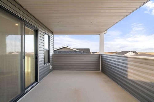 76 Lucas Common Nw, Calgary, AB - Outdoor With Balcony With Exterior