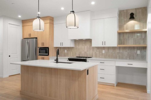 76 Lucas Common Nw, Calgary, AB - Indoor Photo Showing Kitchen With Upgraded Kitchen