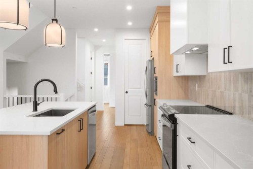 76 Lucas Common Nw, Calgary, AB - Indoor Photo Showing Kitchen With Upgraded Kitchen
