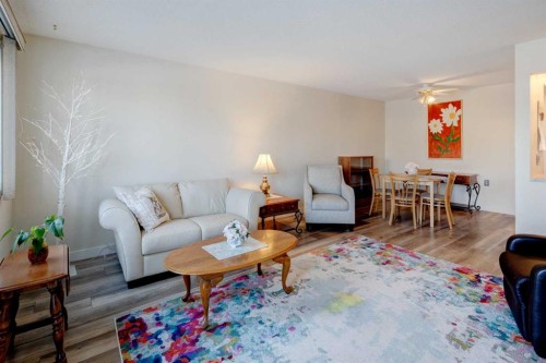 108-309 Woodside Drive Nw, Airdrie, AB - Indoor Photo Showing Living Room