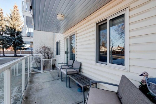 108-309 Woodside Drive Nw, Airdrie, AB - Indoor Photo Showing Living Room