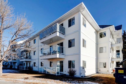 108-309 Woodside Drive Nw, Airdrie, AB - Outdoor