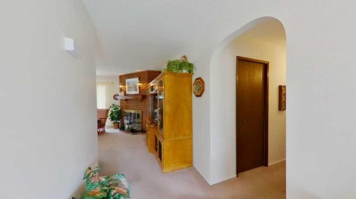 26 Lake Ere Estates, Chestermere, AB - Indoor Photo Showing Other Room