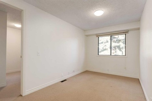 116 Point Drive Nw, Calgary, AB - Indoor Photo Showing Other Room