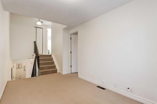 116 Point Drive Nw, Calgary, AB - Indoor Photo Showing Other Room