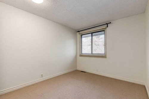 116 Point Drive Nw, Calgary, AB - Indoor Photo Showing Other Room