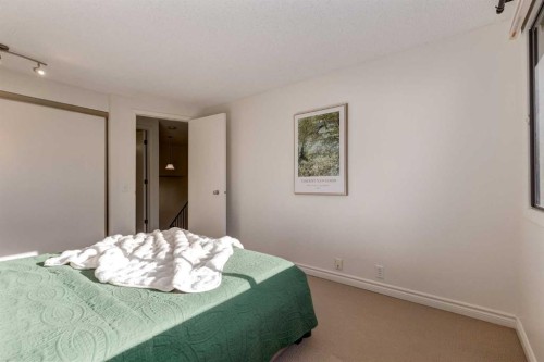 116 Point Drive Nw, Calgary, AB - Indoor Photo Showing Bedroom