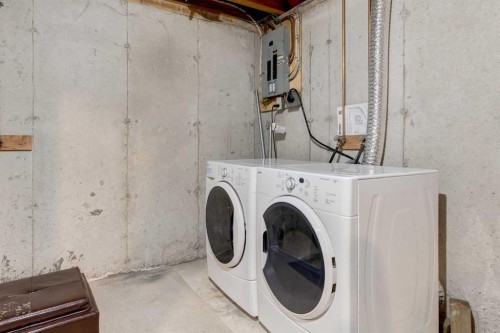 116 Point Drive Nw, Calgary, AB - Indoor Photo Showing Laundry Room