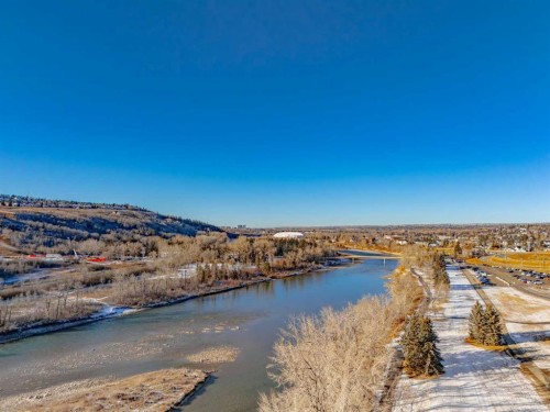 116 Point Drive Nw, Calgary, AB - Outdoor With Body Of Water With View