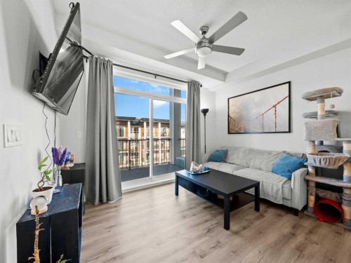 404-25 Walgrove Walk Se, Calgary, AB - Indoor Photo Showing Living Room