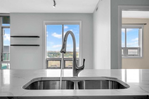 1405-1410 1 Street Se, Calgary, AB - Indoor Photo Showing Kitchen With Double Sink