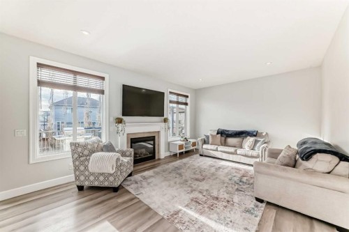 104 Viewpointe Terrace, Chestermere, AB - Indoor Photo Showing Living Room With Fireplace