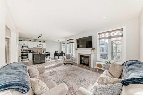 104 Viewpointe Terrace, Chestermere, AB - Indoor Photo Showing Living Room With Fireplace