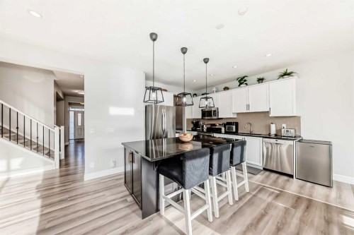 104 Viewpointe Terrace, Chestermere, AB - Indoor Photo Showing Kitchen With Upgraded Kitchen