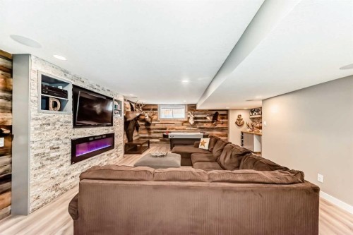 104 Viewpointe Terrace, Chestermere, AB - Indoor Photo Showing Living Room With Fireplace