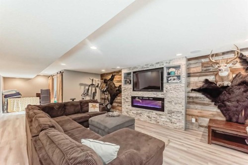 104 Viewpointe Terrace, Chestermere, AB - Indoor Photo Showing Living Room With Fireplace