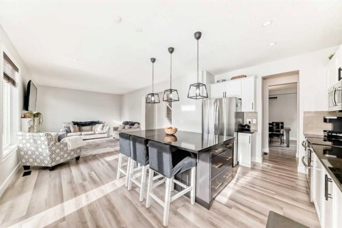 104 Viewpointe Terrace, Chestermere, AB - Indoor Photo Showing Kitchen With Upgraded Kitchen