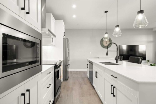 4314-200 Seton Circle Se, Calgary, AB - Indoor Photo Showing Kitchen With Double Sink With Upgraded Kitchen