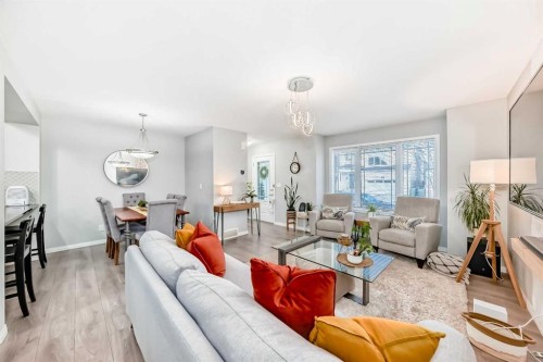 49 Carrington Rise Nw, Calgary, AB - Indoor Photo Showing Living Room
