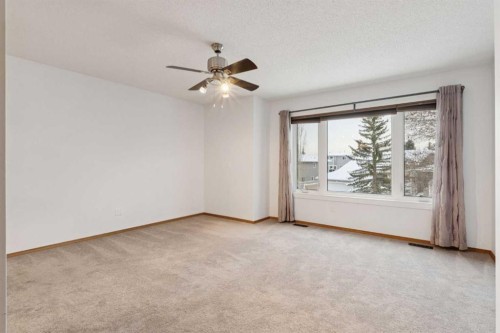 228 Macewan Park View Nw, Calgary, AB - Indoor Photo Showing Other Room