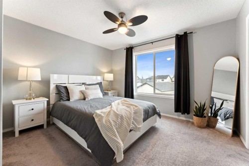 146 Copperstone Grove Se, Calgary, AB - Indoor Photo Showing Bedroom