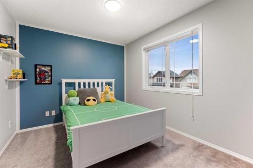 146 Copperstone Grove Se, Calgary, AB - Indoor Photo Showing Bedroom