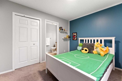 146 Copperstone Grove Se, Calgary, AB - Indoor Photo Showing Bedroom
