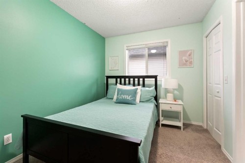 146 Copperstone Grove Se, Calgary, AB - Indoor Photo Showing Bedroom
