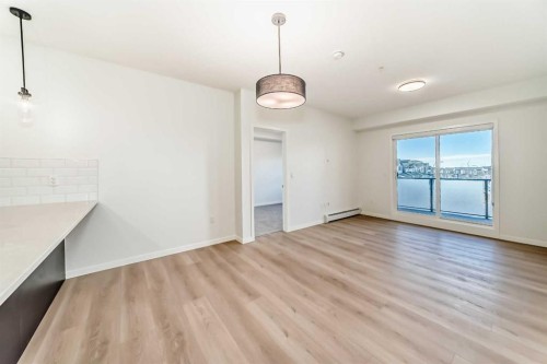 212-245 Edith Place Nw, Calgary, AB - Indoor Photo Showing Other Room