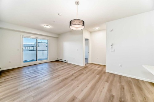 212-245 Edith Place Nw, Calgary, AB - Indoor Photo Showing Other Room